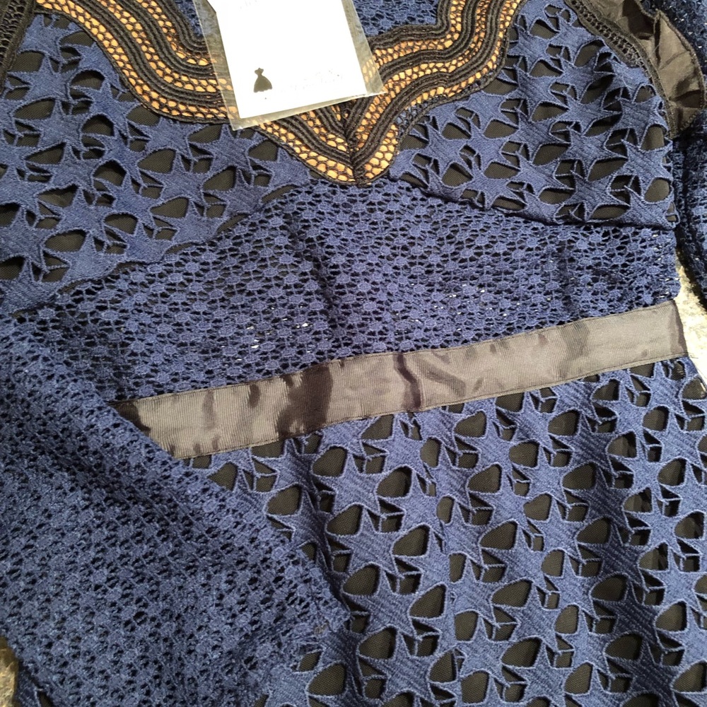 Beautiful star lace dress. Brand new.